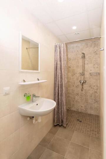 Фото номера Апартаменты с общей ванной комнатой Апарт-отели Mia Guesthouse г. Хальяла 2